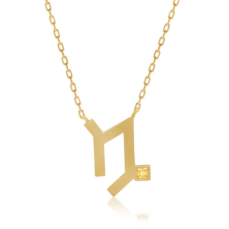 Gold-tone Capricorn horoscope necklace with a square citrine stone accent on a chain, with clean polished V-shaped pendant details.