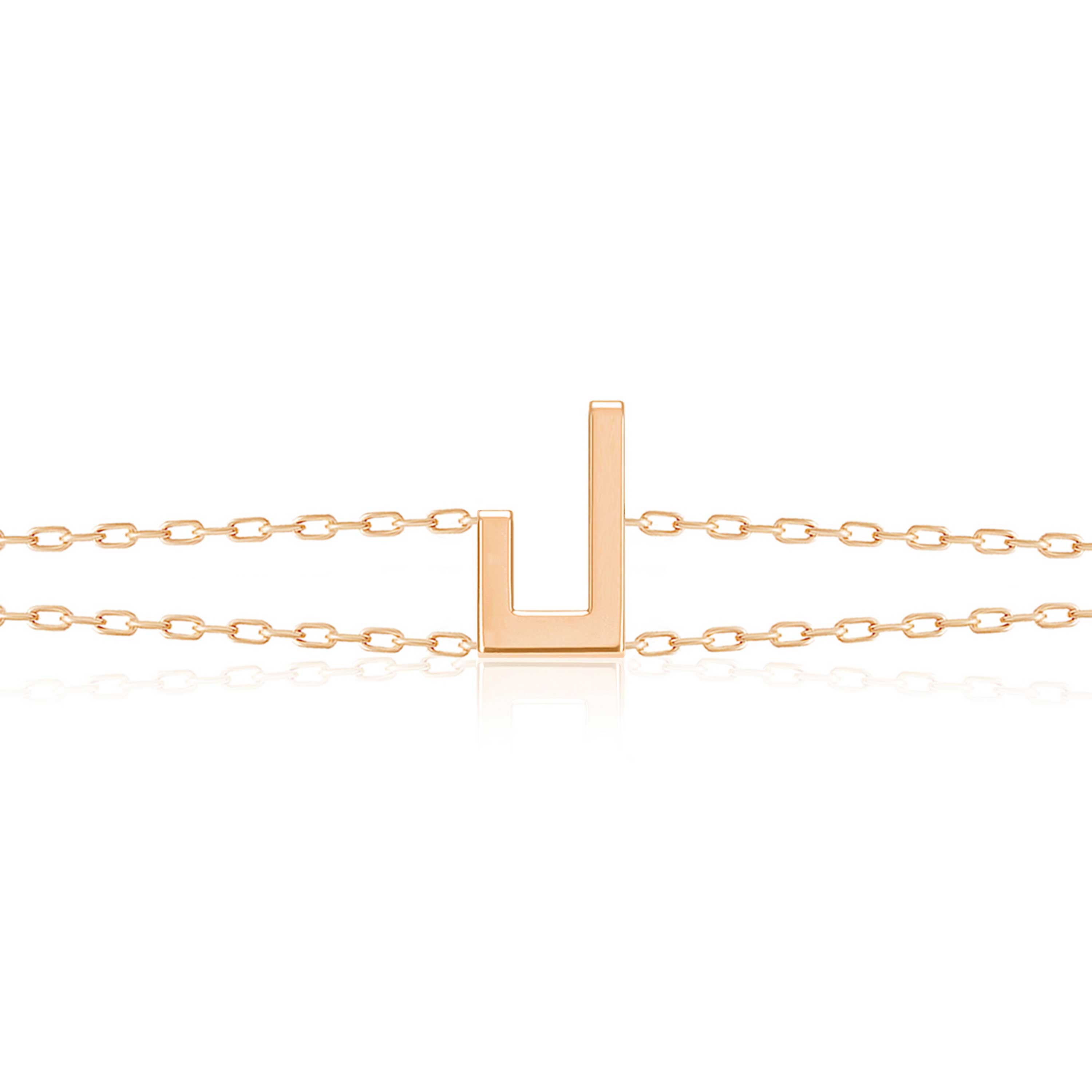 Rose gold Harfi Laam Bracelet with a geometric U-shaped centerpiece and delicate chain links displayed on a white background
