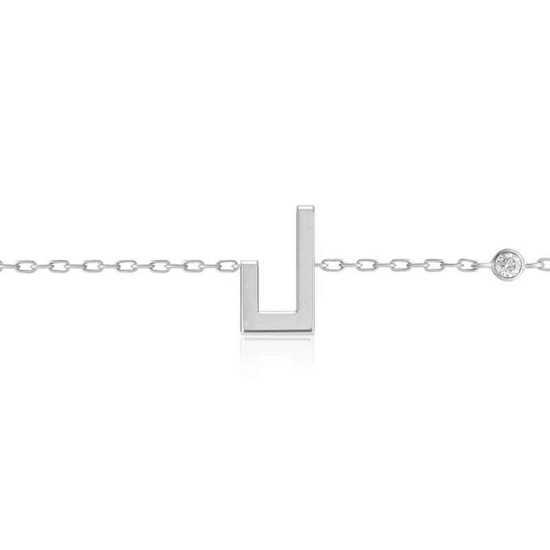Delicate Harfi Laam Bracelet with a geometric silver-toned centerpiece, fine chain links, and a round decorative clasp
