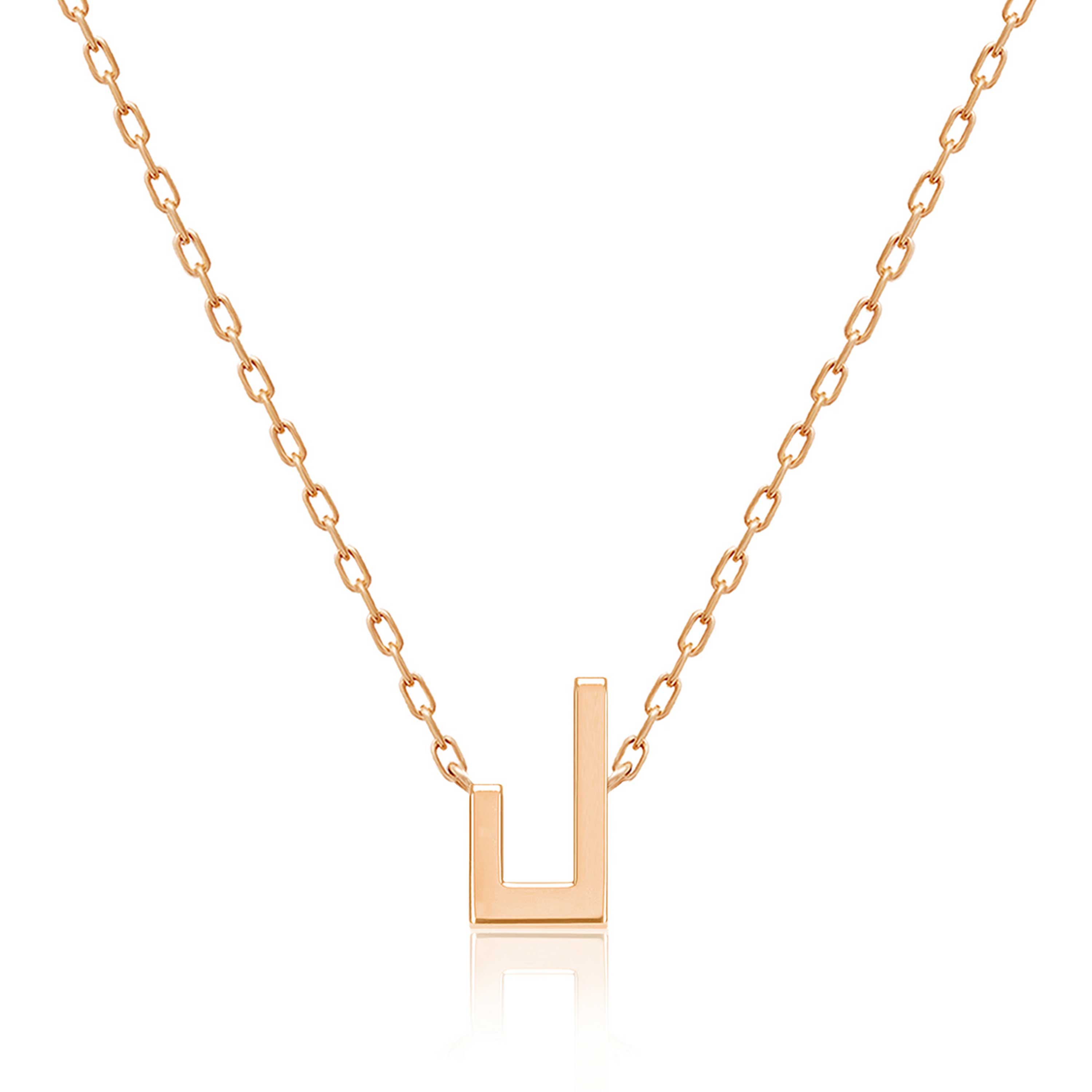A gold-tone Harfi Laam Necklace with a geometric U-shaped pendant and delicate interlocking chain on a white background
