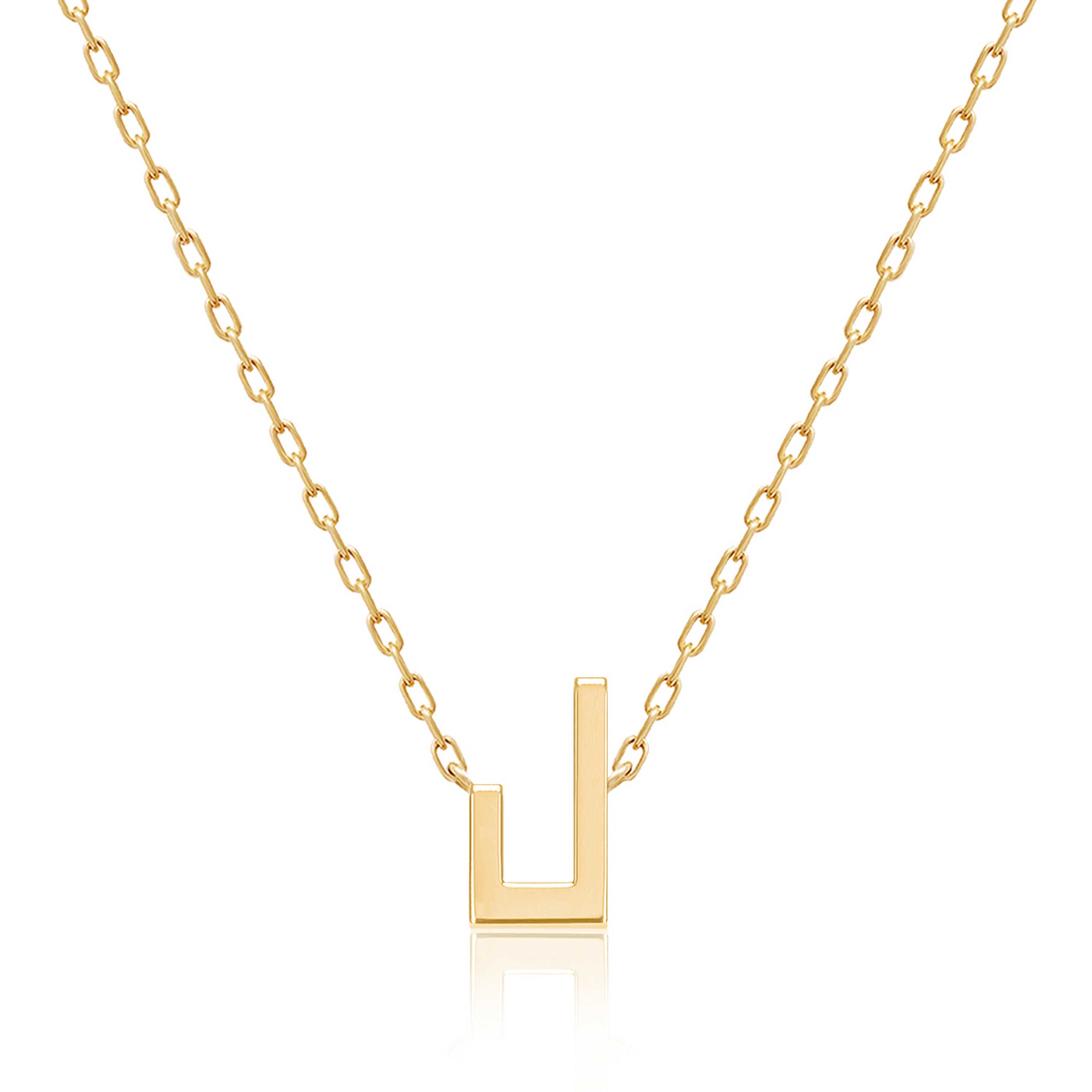 Gold-tone Harfi Laam Necklace with a delicate chain and geometric pendant shaped like the Arabic letter lam on white.