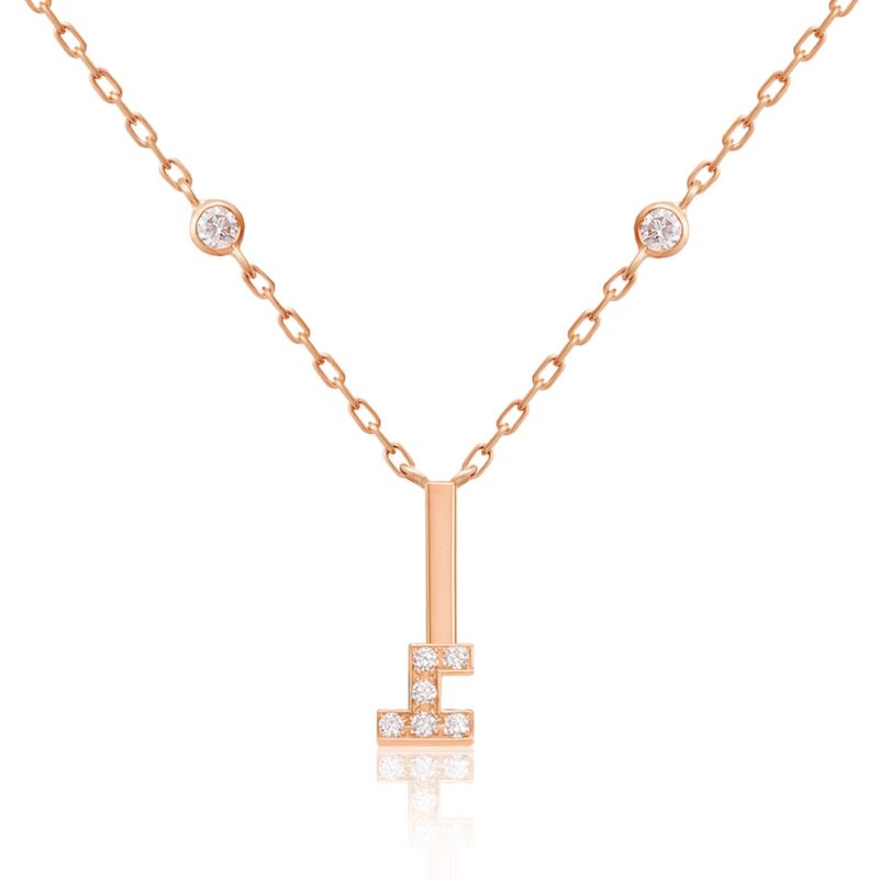 Rose-gold Harfi E (Hamza) necklace with a fine chain, radiant round crystals, and a vertical hamza cross pendant detail.