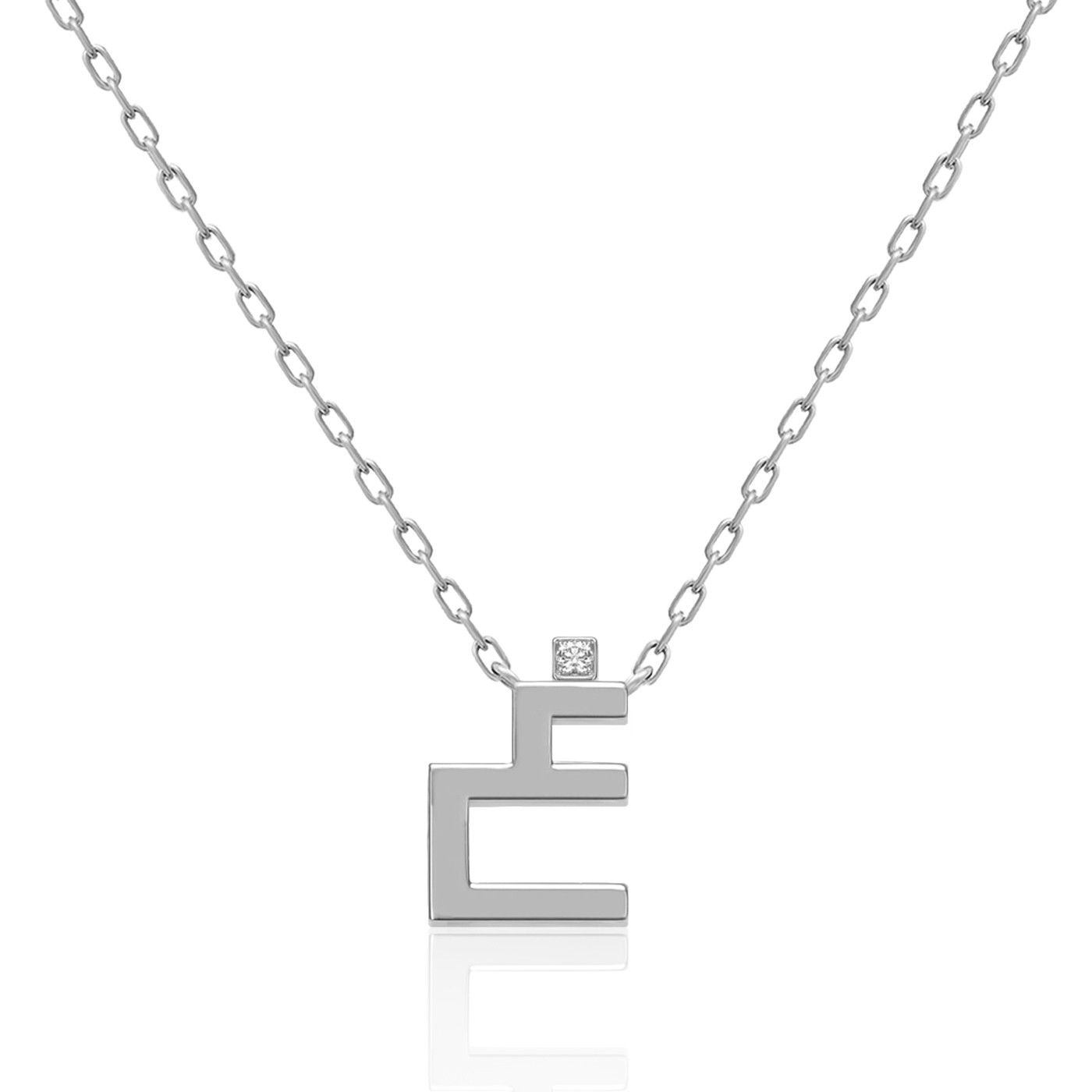 Sterling-silver Harfi Ghain necklace with a geometric pendant and small square gemstone, linked chain detail by Yataghan Jewellery.