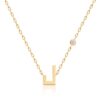Gold Harfi Laam Necklace by Yataghan with a fine chain and a round diamond accent on the pendant.