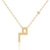Gold-tone Harfi Meem Necklace by Yataghan Jewellery with a delicate chain, a vertical geometric harf charm, and a small round crystal detail.