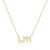 Elegant Harfi Seen Necklace by Yataghan Jewellery with a gold chain and sparkling stones forming a distinctive calligraphy motif.