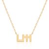 Gold Harfi Seen Necklace with a bold pendant on a linked chain, reflecting Yataghan Jewellery timeless elegance heritage.