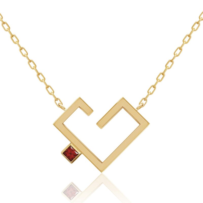 سلسال Hubb Solid Gold Necklace بلمسة ذهبية صفراء وسلسلة متشابكة، مع حرف قلب/شكل V بتصميم هندسي وحجر أحمر متوهج يضيف لمسة فاخرة