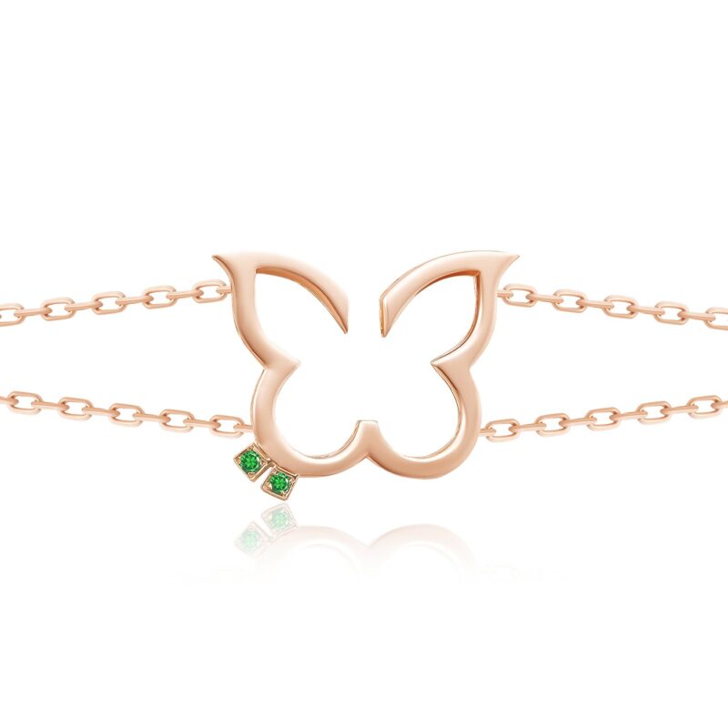Hurriyah Bracelet by Yataghan Jewellery with rose gold tone chain links and green stones, for a timeless elegance look