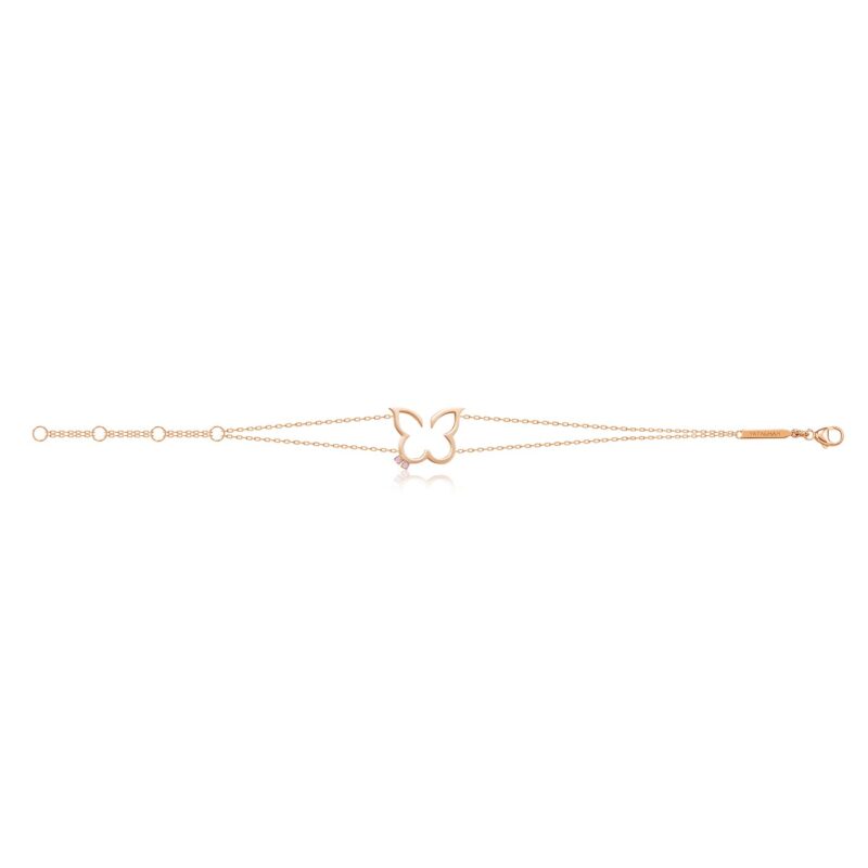 A pink Hurriyah Bracelet with a delicate butterfly charm, sparkling stones, and an engraved Yataghan Jewellery clasp.