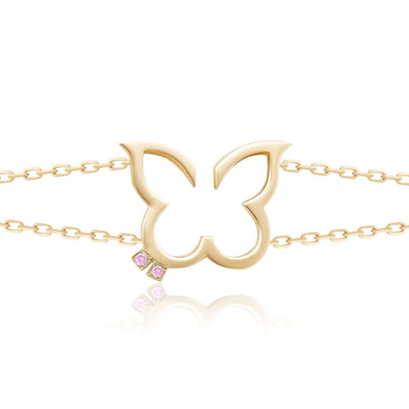 A gold-tone Hurriyah Bracelet with linked chain and pink stones, showcasing an elegant openwork charm with a refined shine.