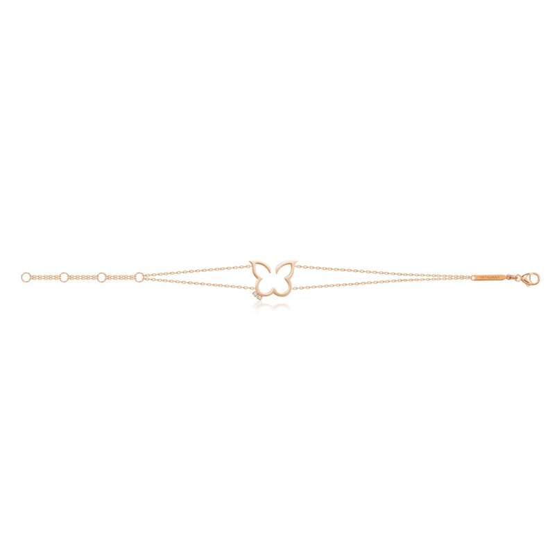 Rose-gold Hurriyah Bracelet with a butterfly-shaped charm and fine chain, finished with YATAGHAN branding and a clean white look.