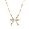 Gold horoscope necklace with a Pisces pendant, turquoise square stones and sparkling white accents along a chain by Yataghan Jewellery.