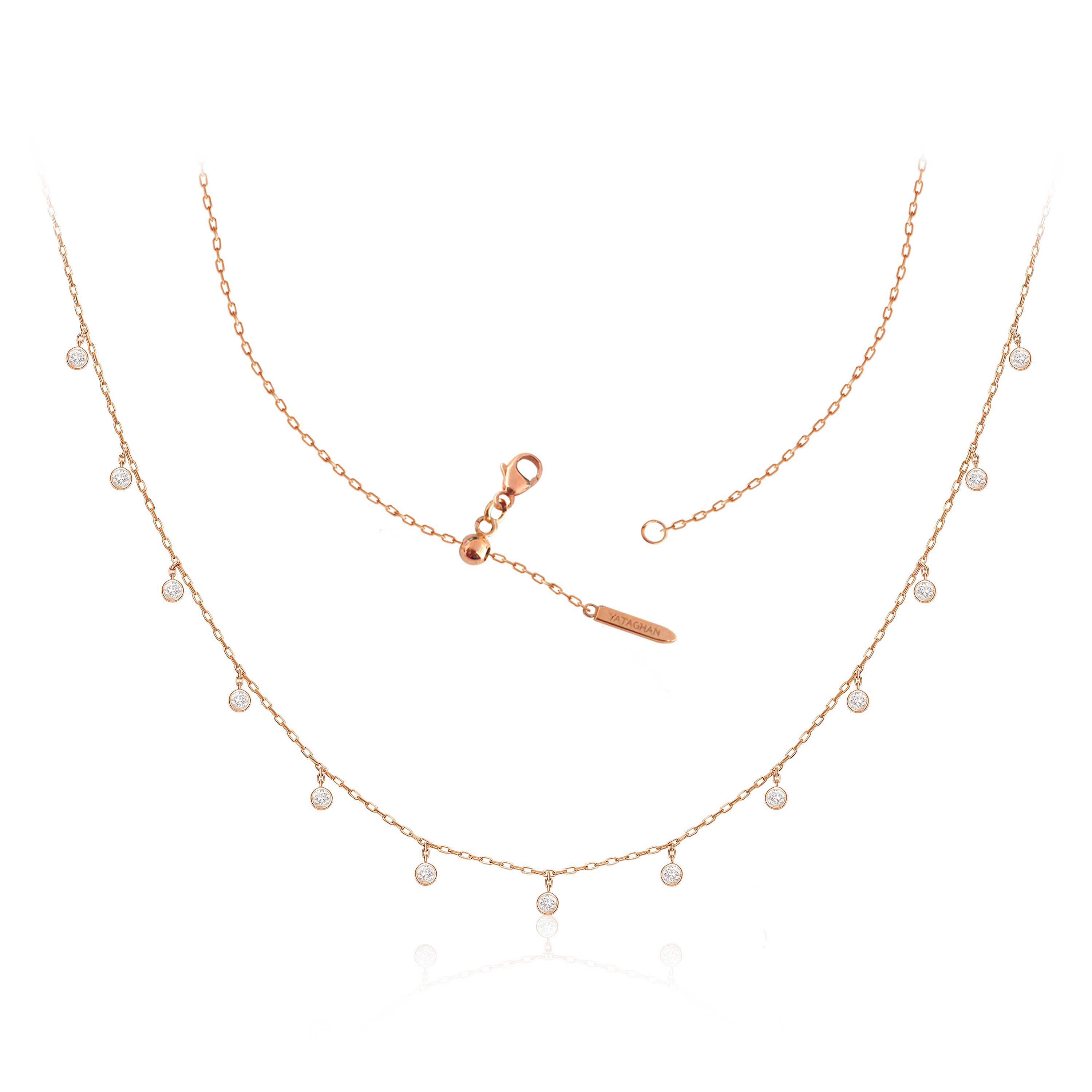 A rose gold Sparkle Round Necklace from Yataghan Jewellery shows a delicate chain with round crystal drops and a branded clasp.