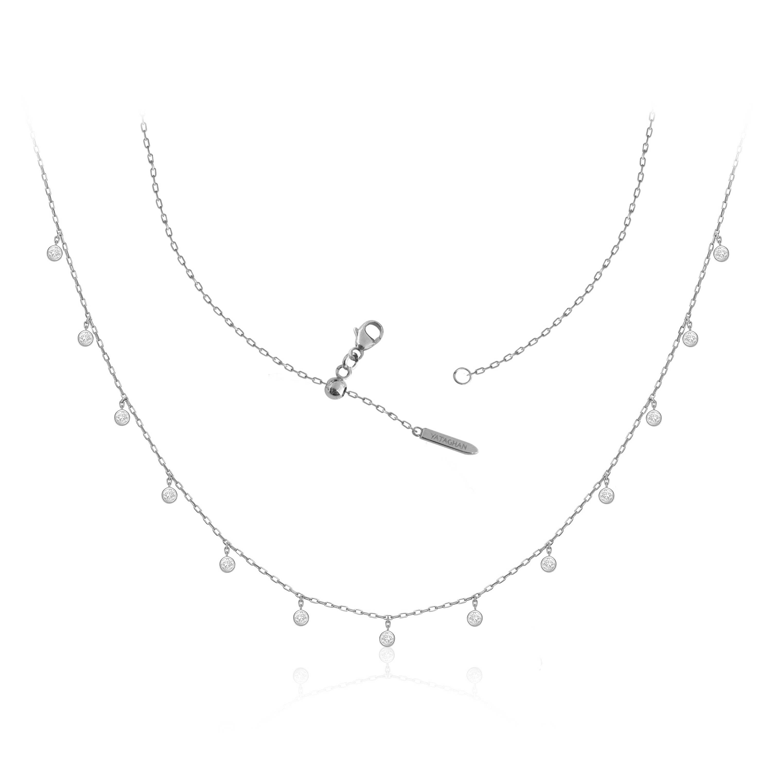 Silver Sparkle Round Necklace from Yataghan Jewellery with delicate chains and small round crystal charms in a refined layered design.