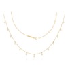A delicate gold Sparkle Round Necklace from Yataghan Jewellery with dangling round charms and crystal accents, shown against a clean white background.