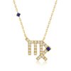 Virgo horoscope necklace with princess cut sapphire in a square setting, surrounded by round diamonds on a gold chain.