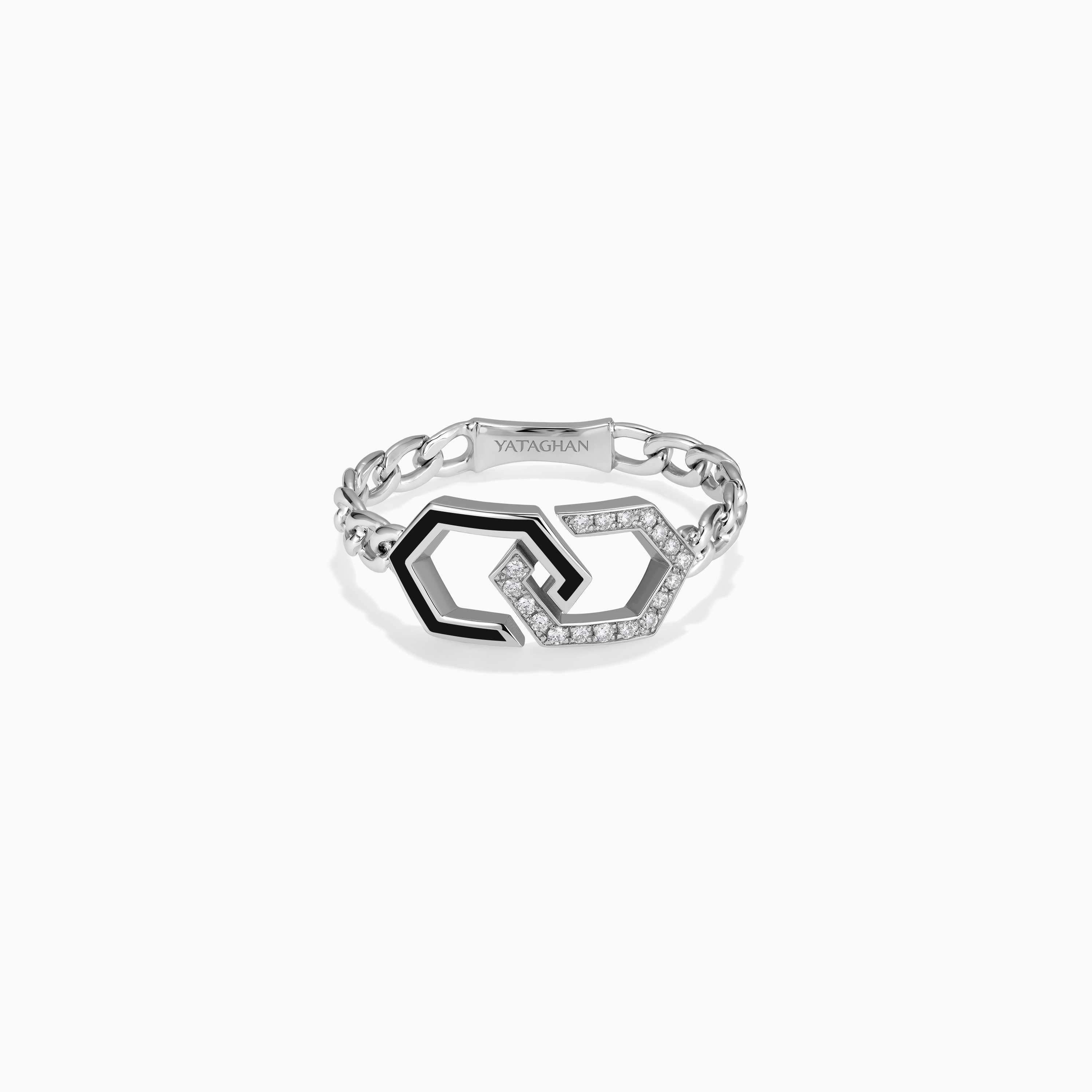 A silver Yataghan Infinity ring pairs black enamel links with a geometric diamond motif and chain band, creating a bold modern jewelry look.