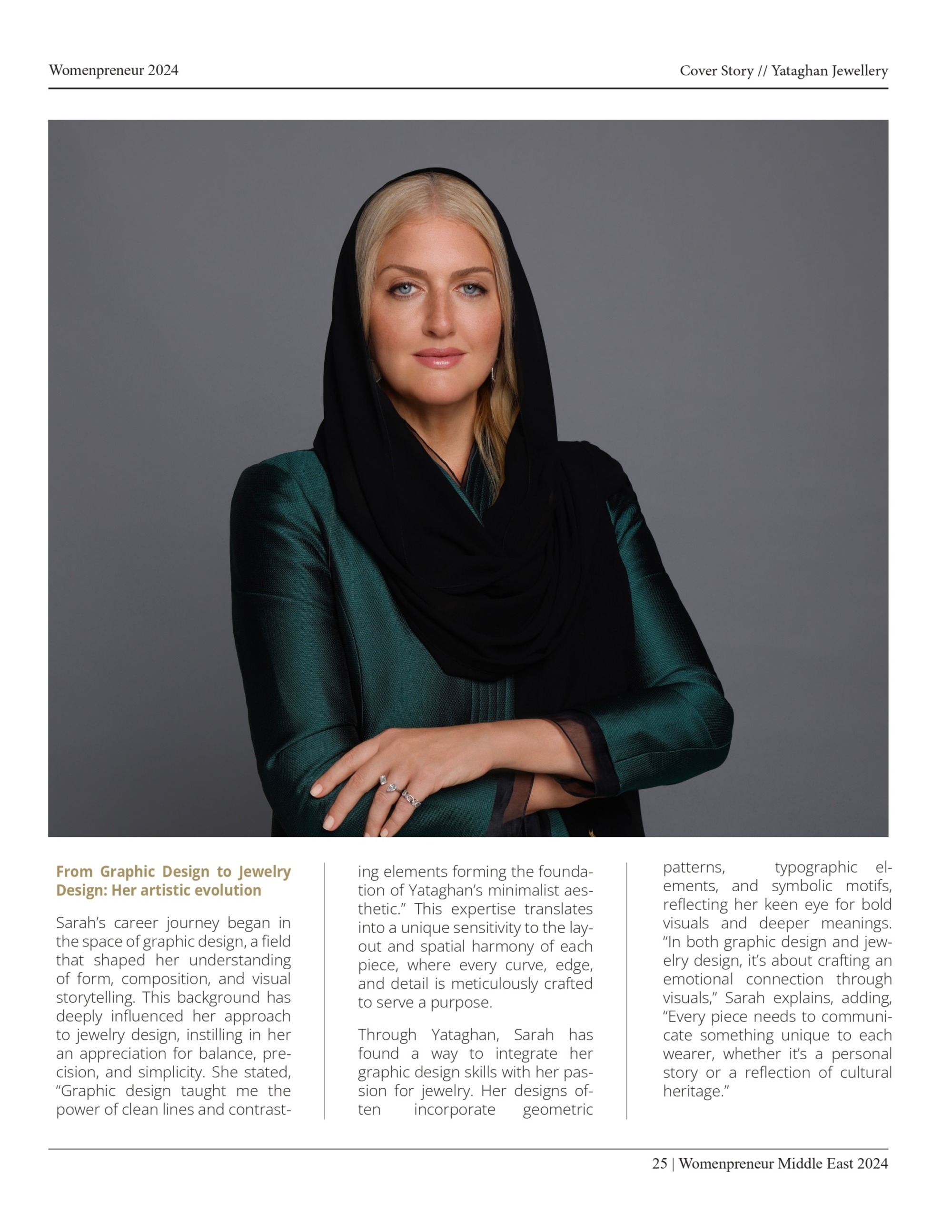 Sarah poses in a black headscarf and deep green dress for Womenpreneur Middle East 2024, with Yataghan Jewellery rings and a refined studio backdrop.