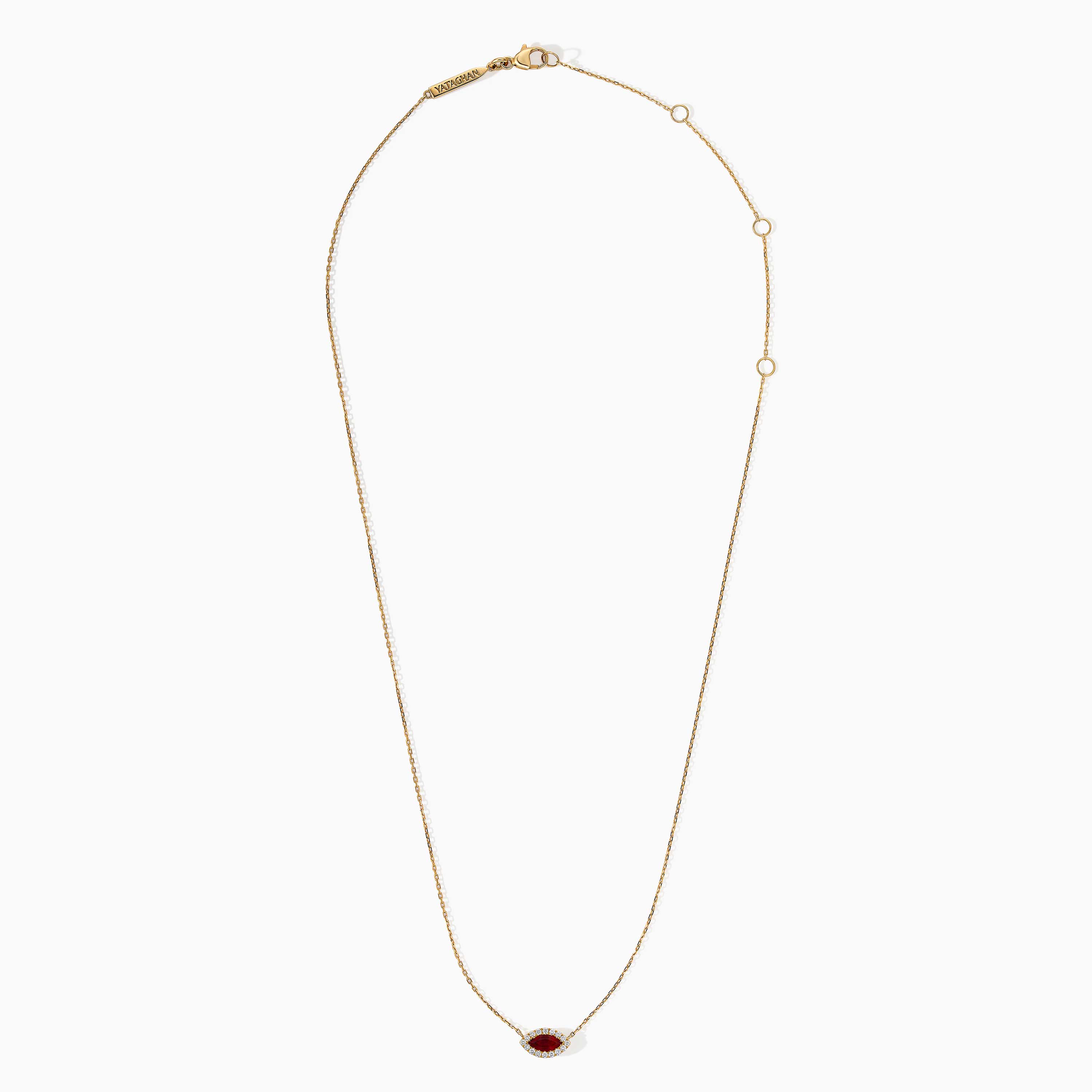 Delicate gold necklace with a marquise ruby pendant framed by diamonds and Yataghan clasp details.