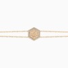 Gold Ayat Al-Kursi Bracelet with a shield-shaped centerpiece and Arabic calligraphy set in diamond-cut stones along the chain.