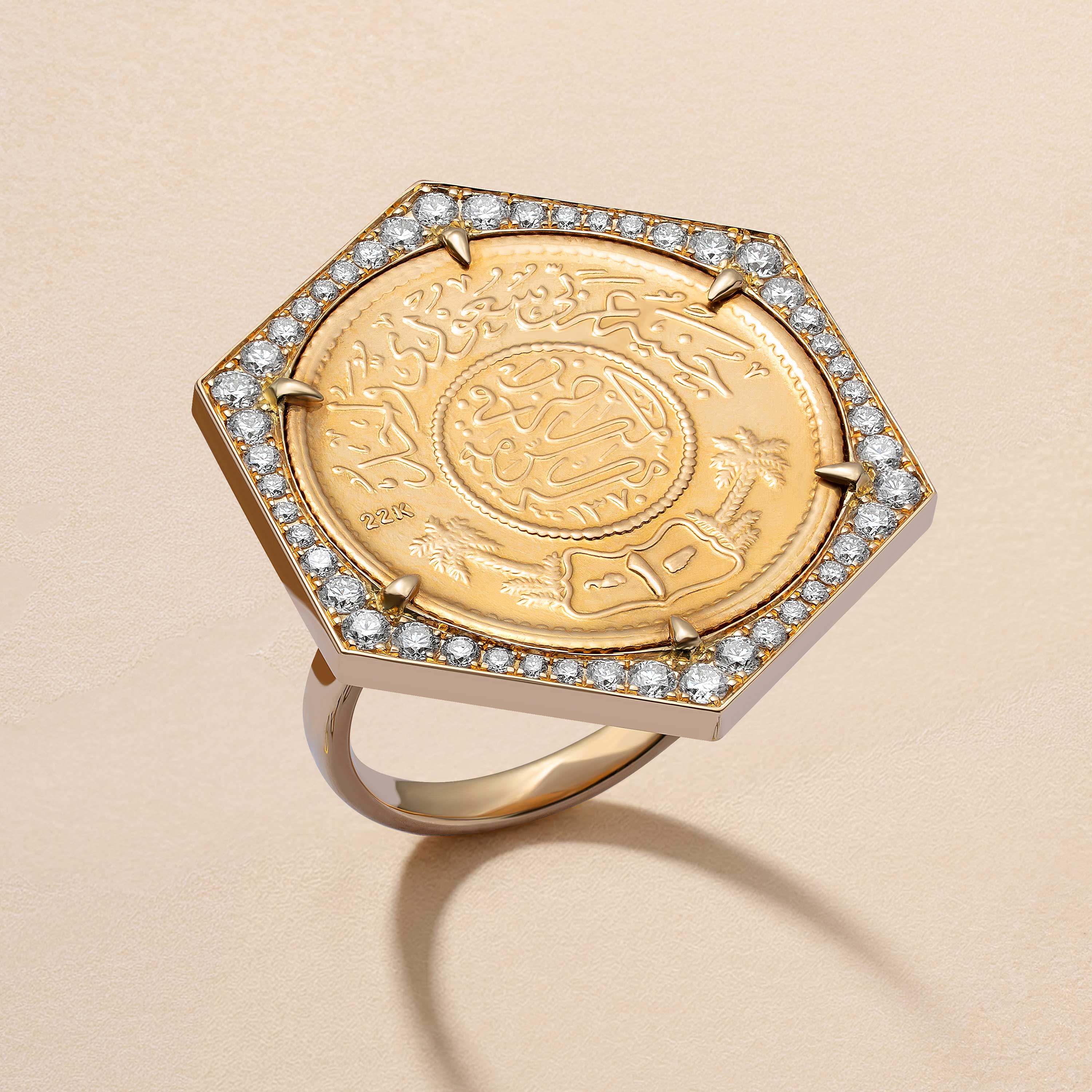 Ginea Ring in diamond frame with a gold engraved centerpiece and crisp white stones set along the border in a clean geometric setting