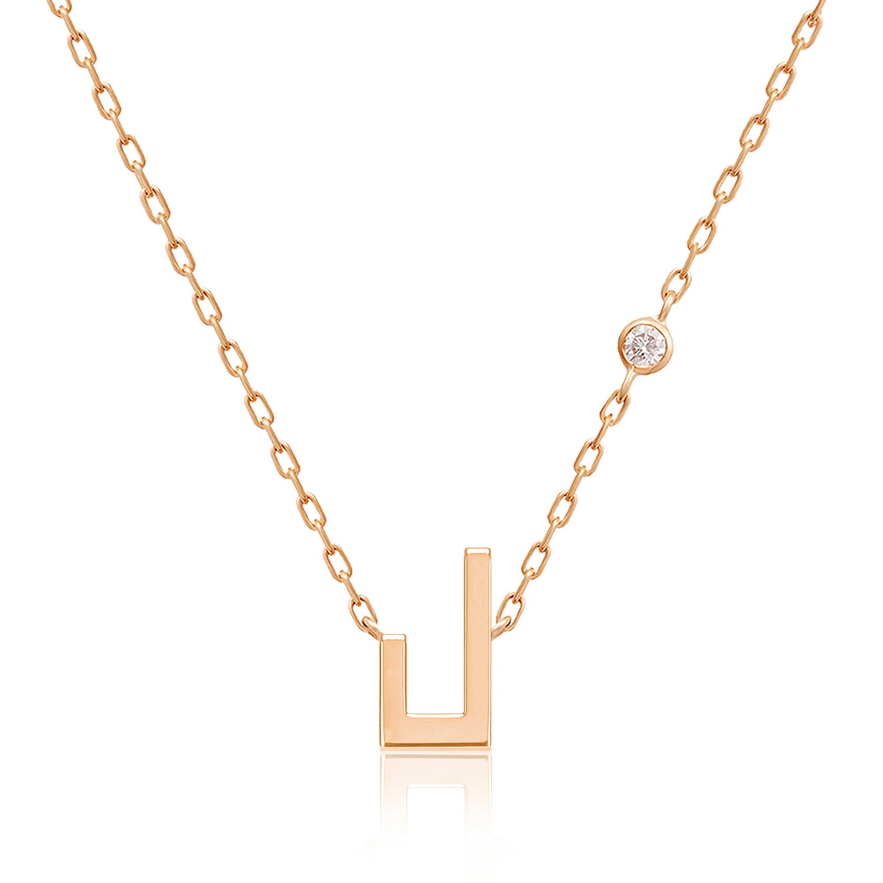 Harfi Laam Necklace by Yataghan Jewellery, a rose-gold chain with a geometric U-shaped pendant and diamond accent.