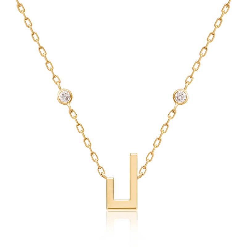 Gold-tone Harfi Laam necklace with a geometric pendant, linked chain, and two round sparkling accents from Yataghan Jewellery
