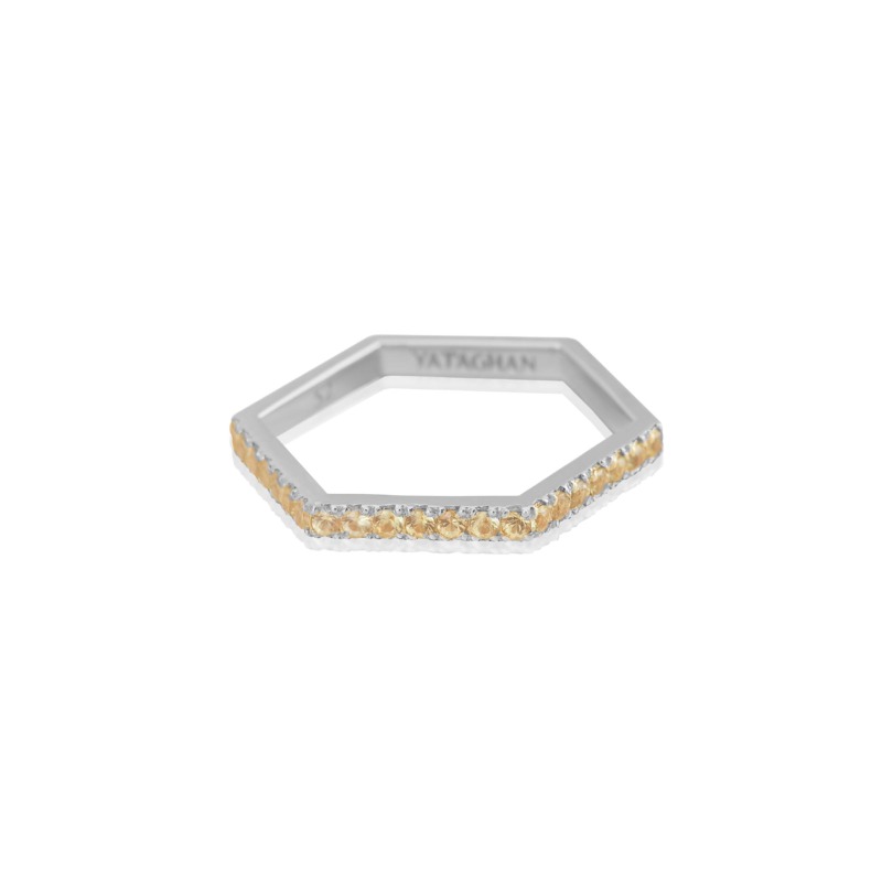 A hexagon white gold ring with a single row of diamonds, engraved “YATAGHAN” along the inner band for Hexagon Ring.