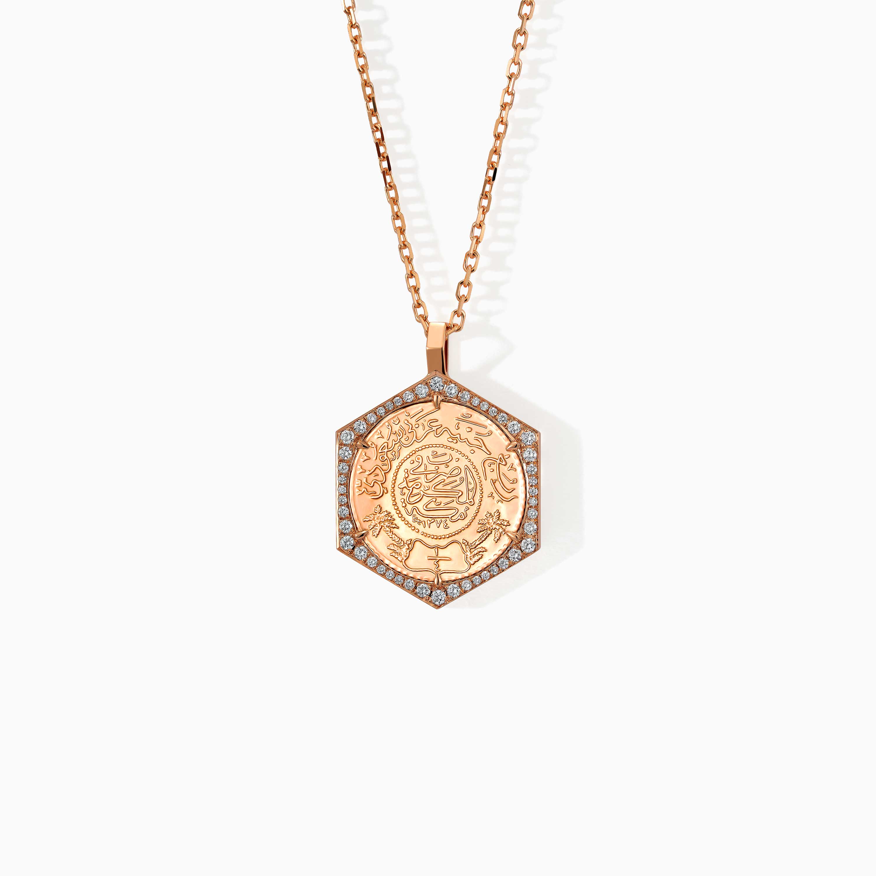 Gold Ginea Necklace with a diamond frame pendant and Arabic calligraphy medallion, set on a chain with a polished finish.