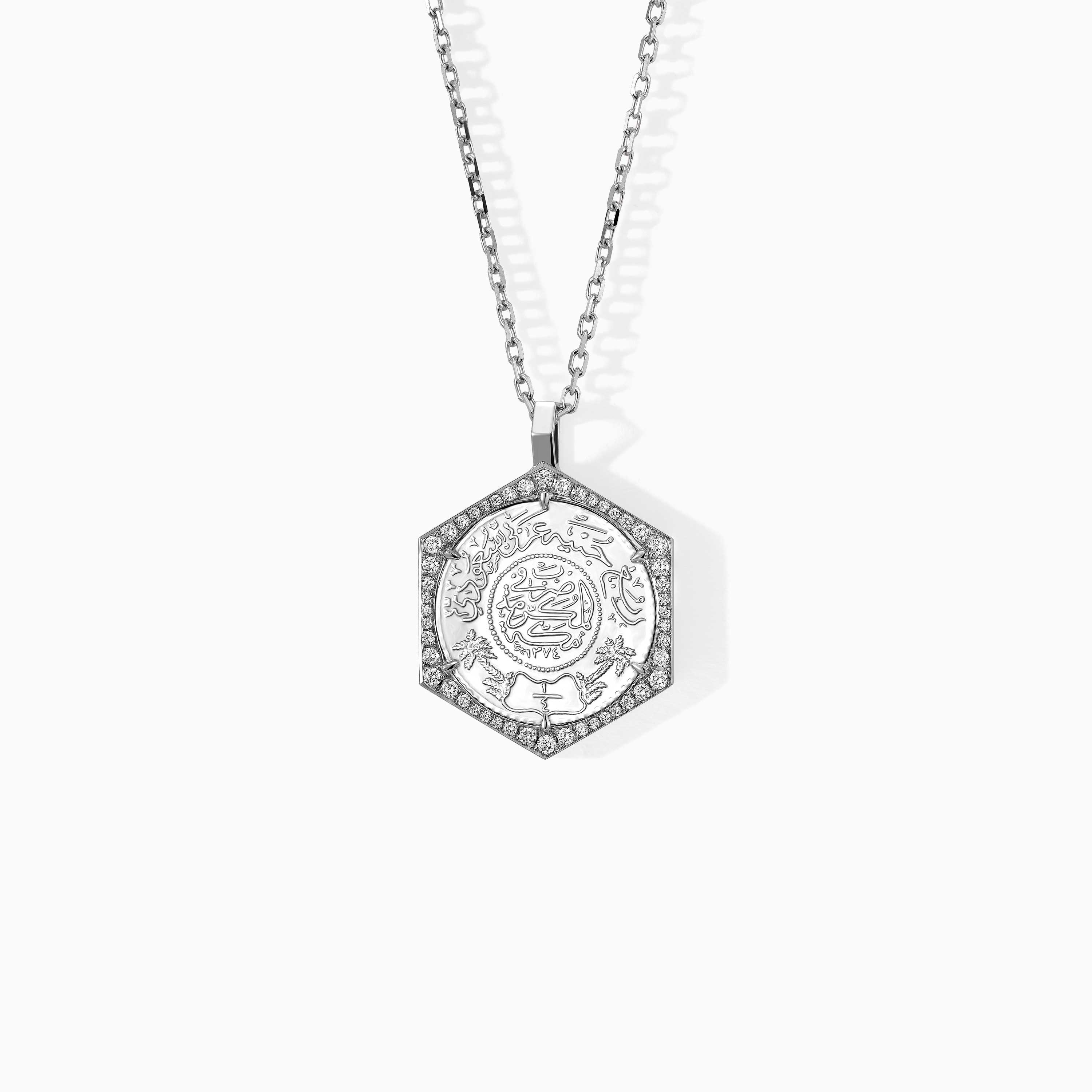 Silver-tone Quarter Ginea Necklace in Diamond Frame with a chain and a detailed pendant face inlaid with sparkling diamonds.