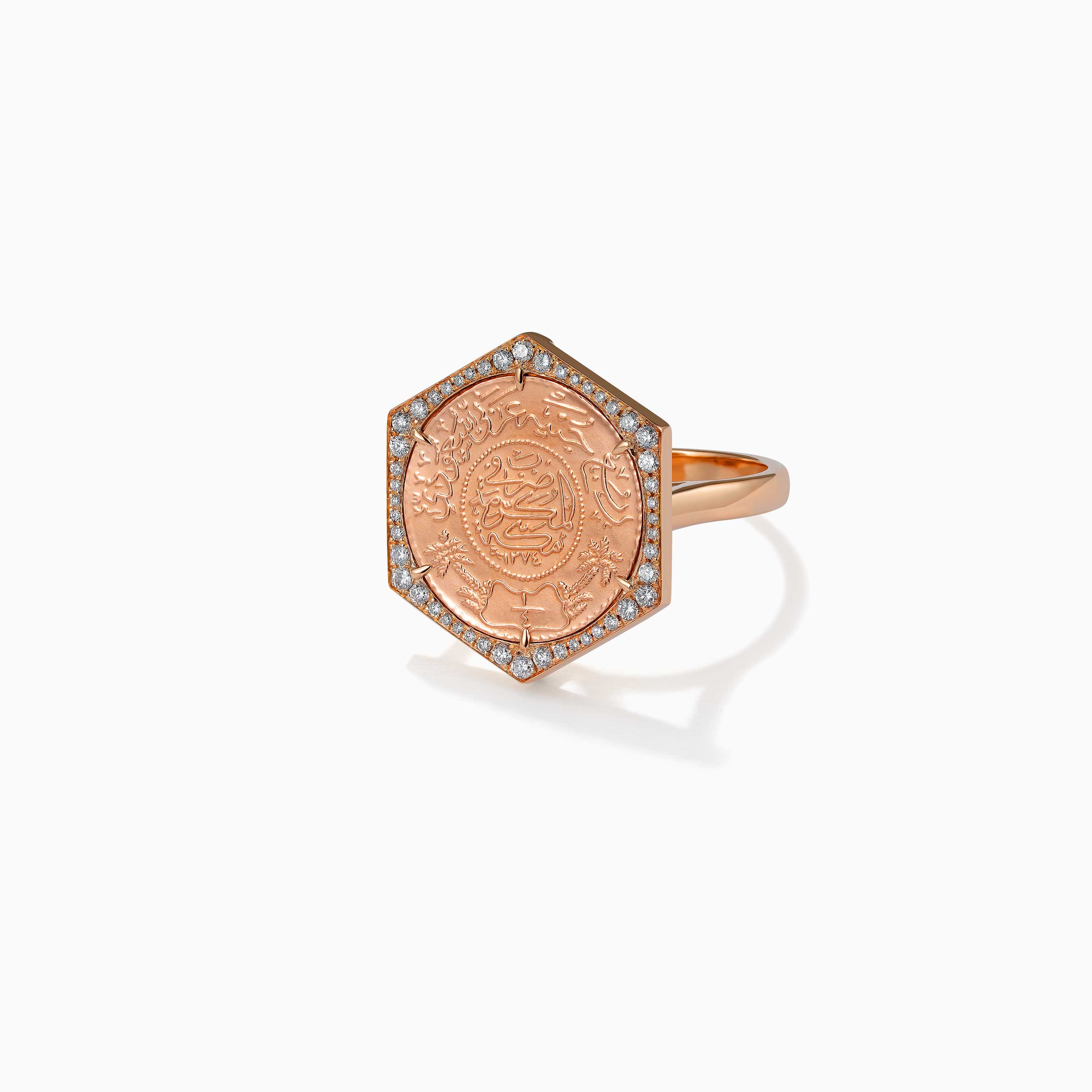 Quarter Ginea Ring in Diamond Frame with diamond-set border and rose-gold tone oval face, engraved Arabic calligraphy medallion.
