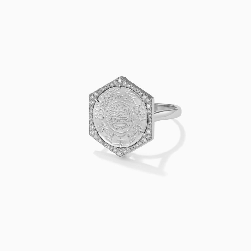 Quarter Ginea Ring in Diamond Frame by Yataghan Jewellery with a diamond-set border and engraved center featuring Ginea detailing.