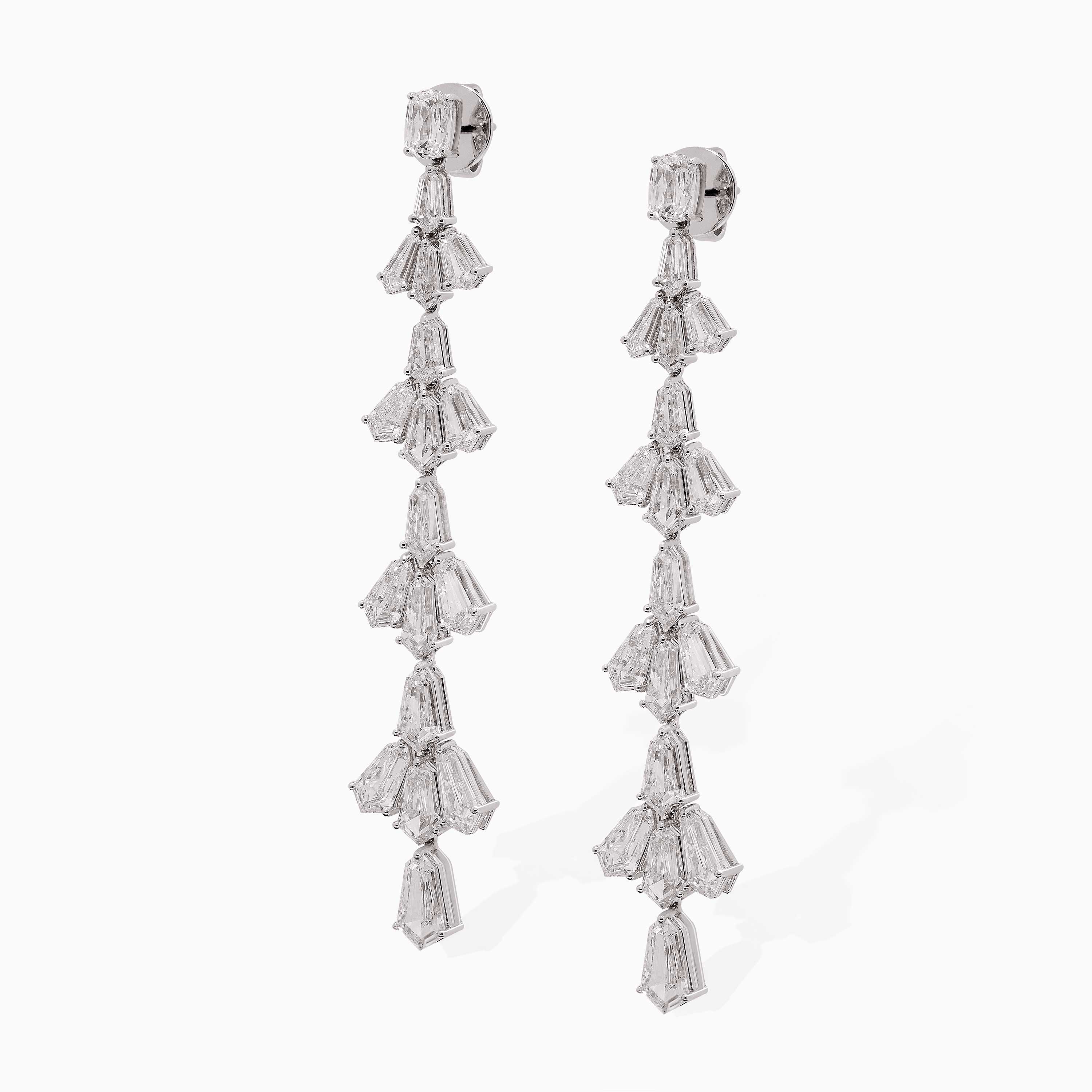 Dangling Lotus Evening Earrings by Yataghan Jewellery in silver with sparkling crystal-styled drops and a refined lotus silhouette.