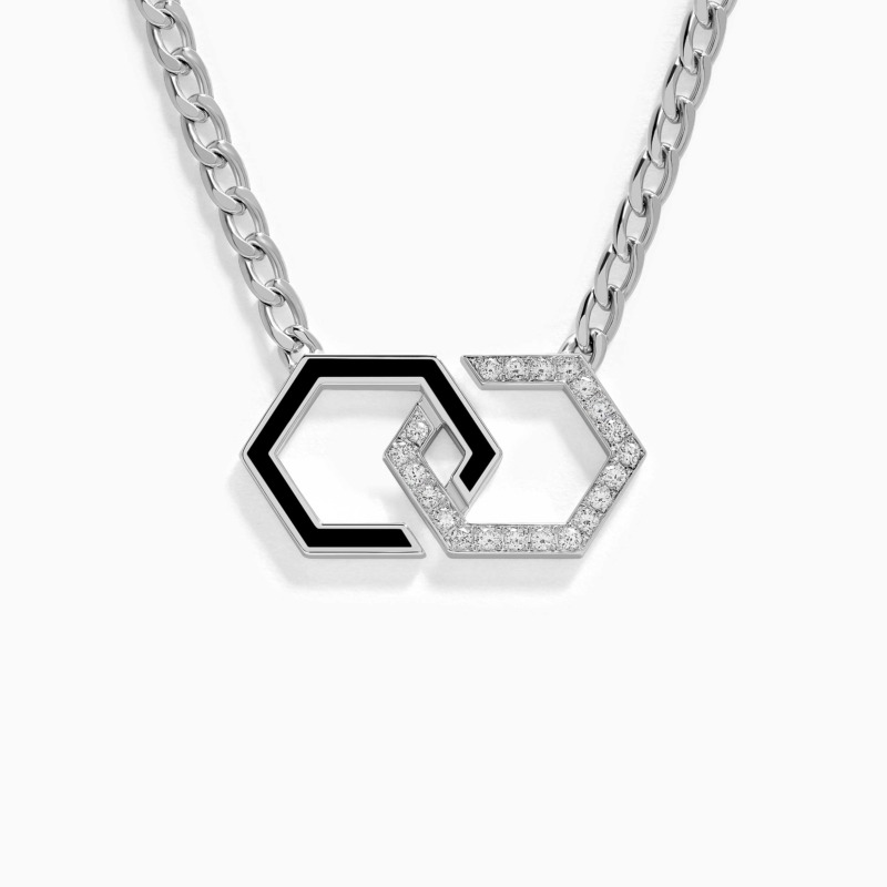 Black enamel and diamond infinity pendant necklace from Yataghan Jewellery, with interlocking geometric links on a polished silver chain.