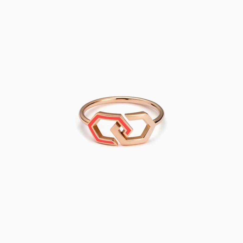 Delicate gold infinity ring band with orange and pink enamel accents, shaped into interlocking geometric loops against a clean white background.