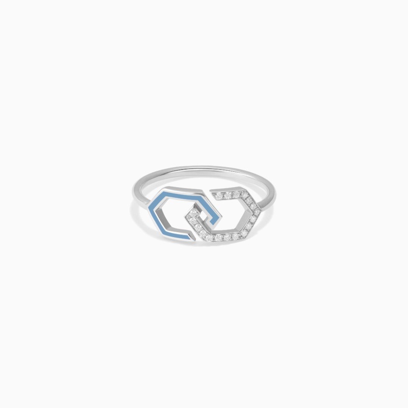 A silver Infinity Enamel Diamond Ring Band combines blue enamel lines with pavé diamonds in a clean geometric design on a white background.