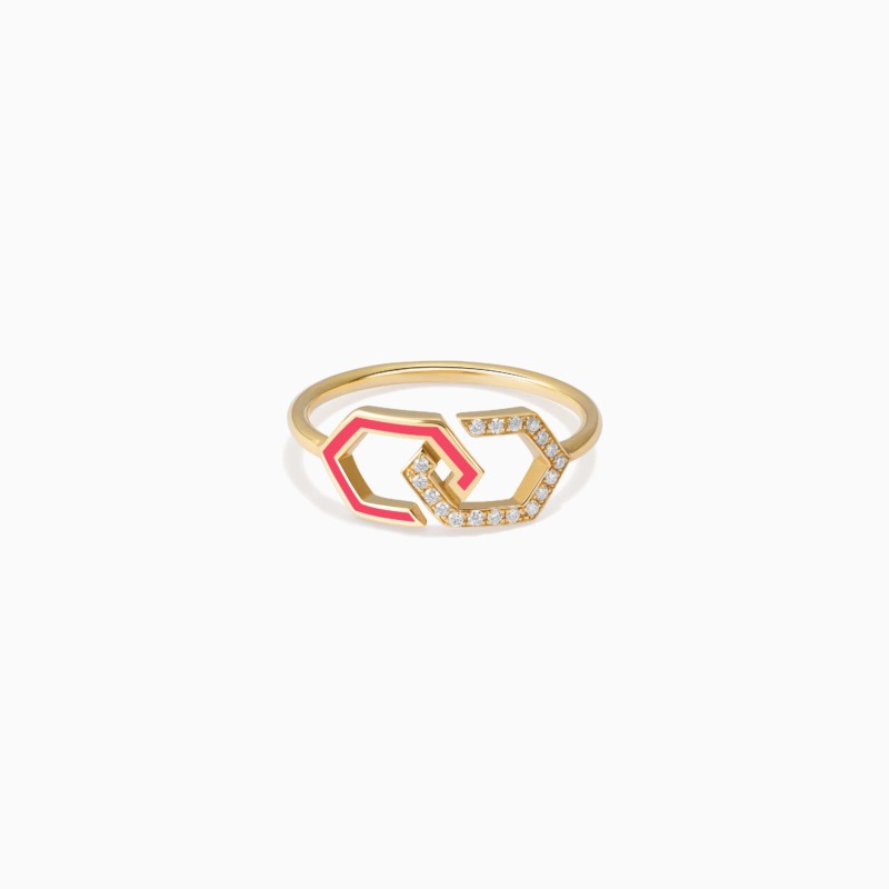 A gold Infinity Enamel Diamond Ring Band with pink enamel accents and diamond-set links rests against a clean white background.
