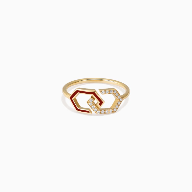 A gold Infinity Enamel Diamond Ring Band with red enamel and diamond details rests against a clean white background, creating a refined modern look.
