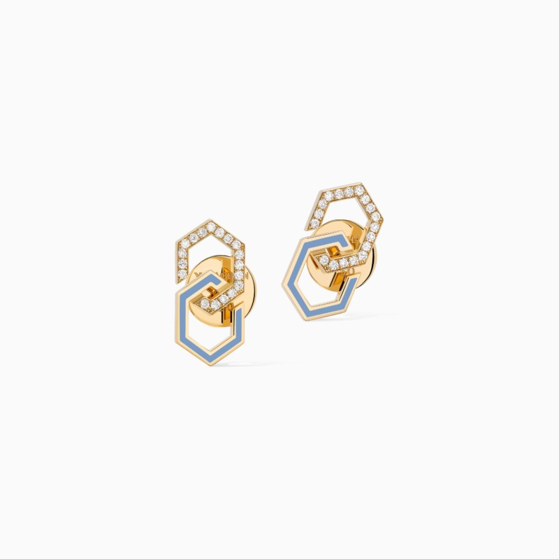 Infinity Enamel Diamond Stud Earrings in gold with blue enamel and diamond accents stand against a white background, with a mirrored pair of geometric designs.