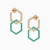 Two gold Infinity earrings with turquoise enamel and diamond-set hexagonal outlines rest against a clean white background.