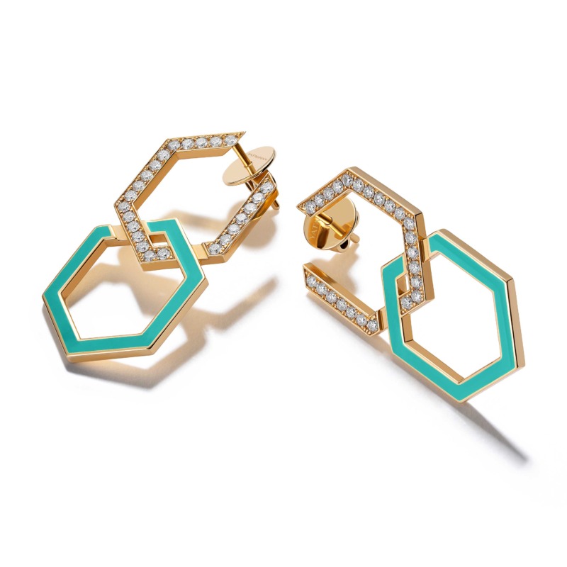Turquoise enamel and diamond geometric earrings with gold-tone edges rest on a white background, creating a striking modern luxury jewelry look.