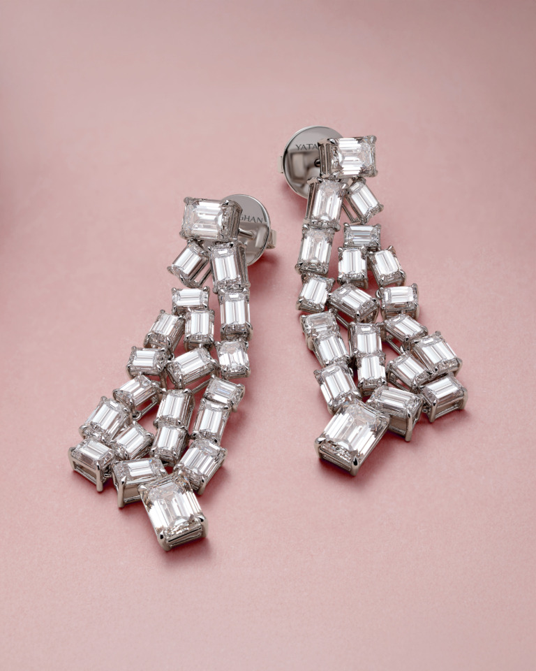 Yataghan Jewellery High Jewellery emerald-cut diamond earrings with 18.49 ct stones, arranged in cascading rows of brilliant baguette diamonds.