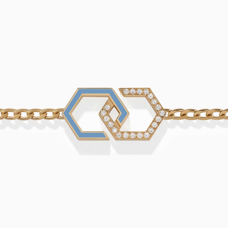 A gold bracelet with baby blue enamel infinity links and diamond-set hexagon details stretches across a clean white background.