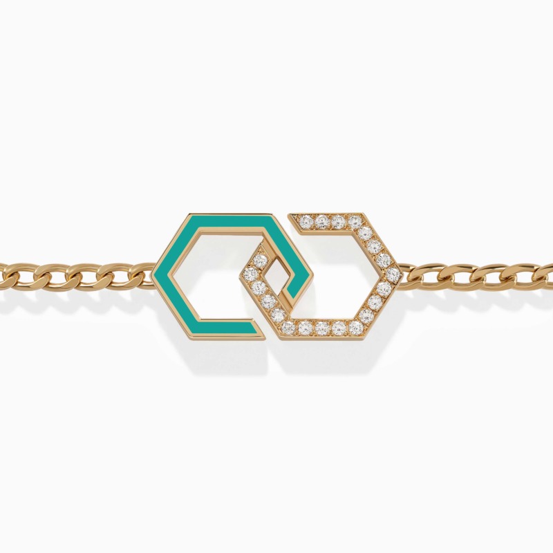 A turquoise enamel infinity motif joins a gold chain bracelet with diamond-set links and a polished geometric clasp against a clean white background.