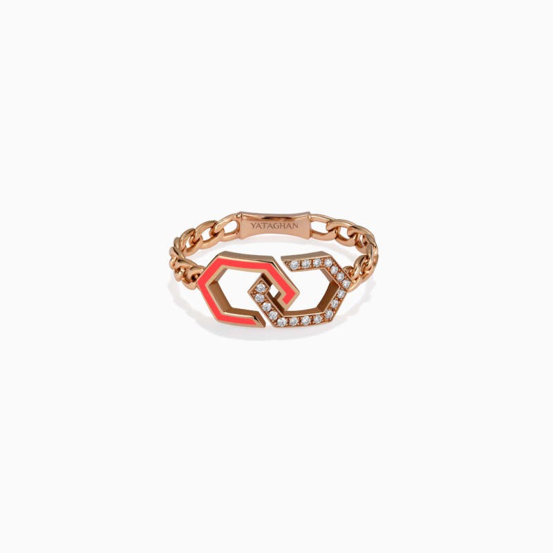 Pink enamel and rose gold Infinity Unchained ring with chain links and diamond accents, resting against a clean white background at Yataghan Jewellery.