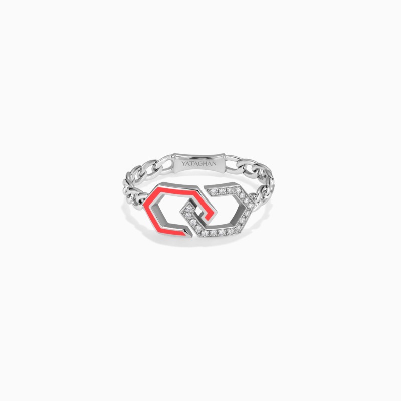 A silver Infinity Enamel Unchained Diamond Ring with red enamel edges and diamond links rests against a clean white background.