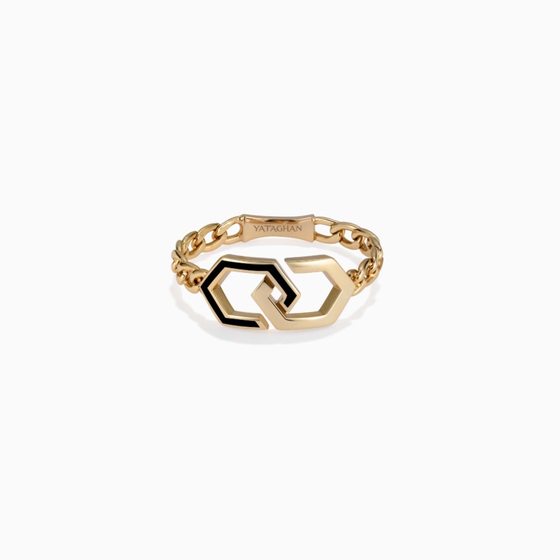 A gold Infinity Enamel Unchained Gold Ring with black enamel links is shown against a white background, with interlocking geometric shapes and chain details.