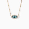 A marquise blue topaz pendant framed by diamonds hangs from a gold chain on a white background.
