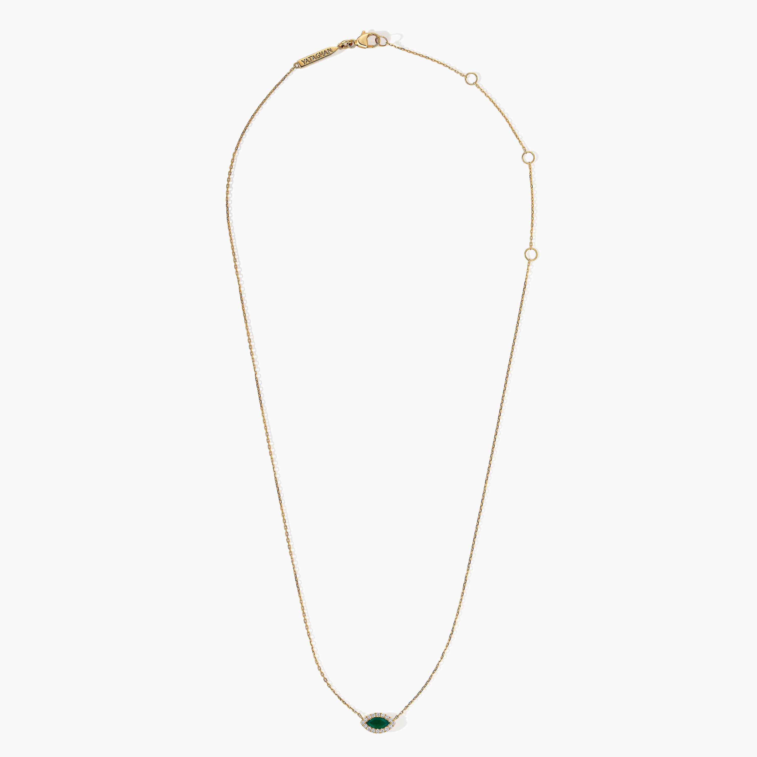 Yataghan Jewellery The Eye necklace in gold with a marquise emerald center and diamond halo on a fine chain.